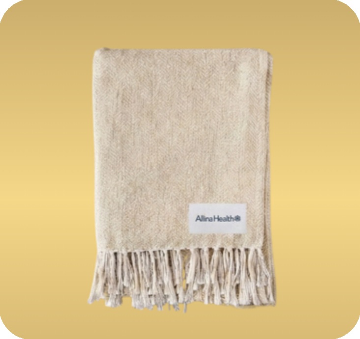Allina Health branded throw blanket